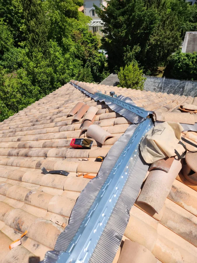 Réparation faîtage et zinguerie